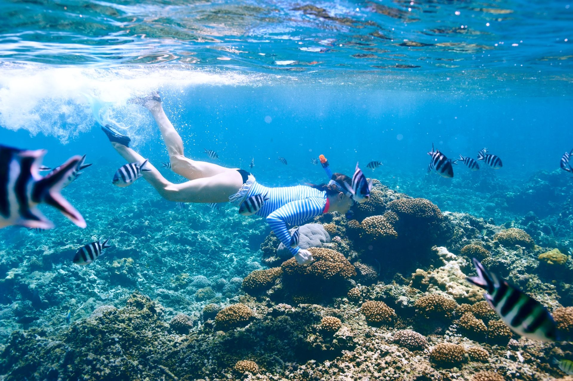 woman-with-mask-snorkeling-e1640857478760